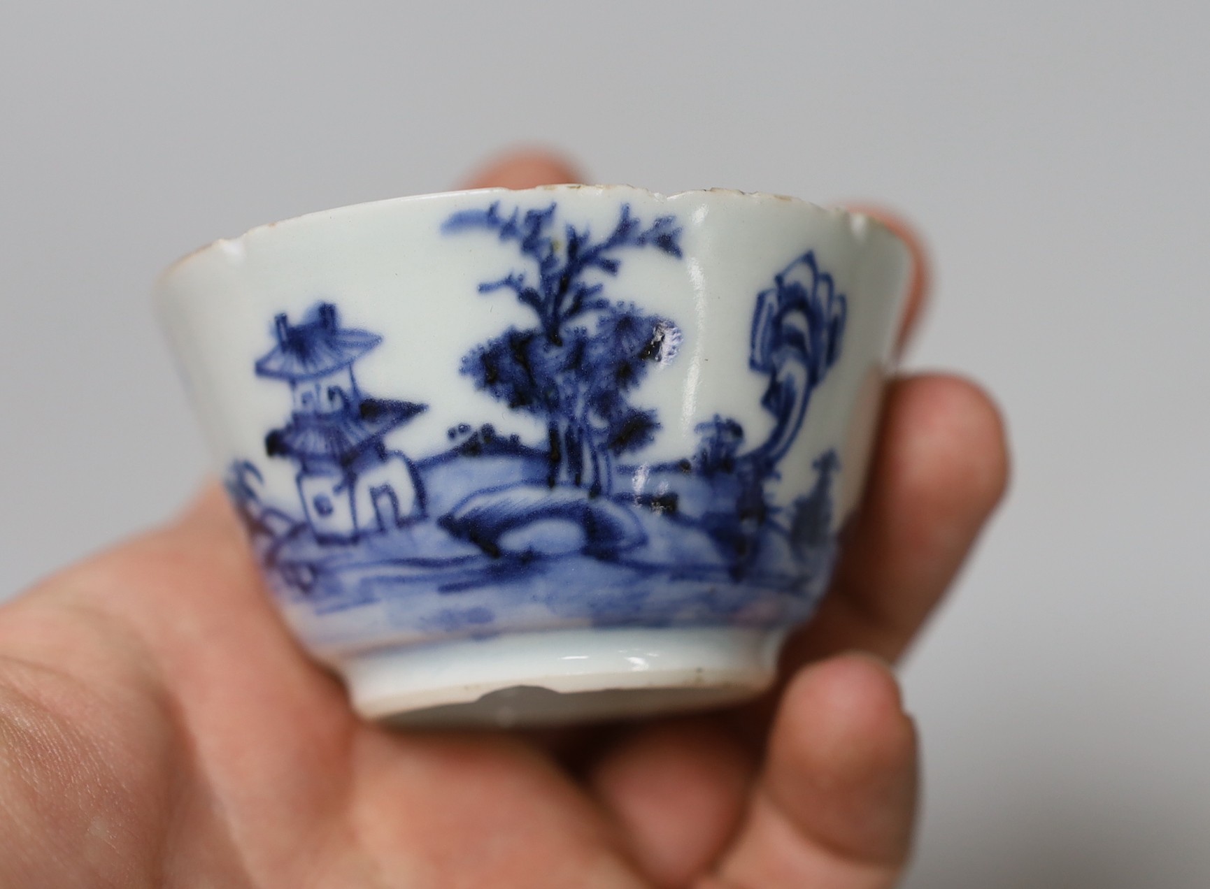 A Chinese Kangxi blue and white tea bowl and saucer, and a blue and white bowl, largest 13cm diameter